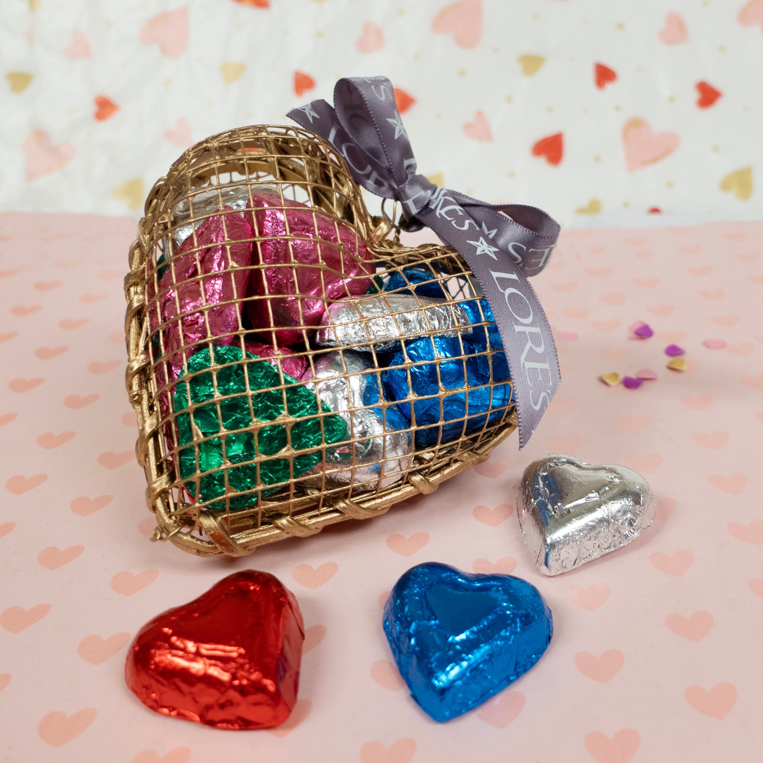 gold wired cage full of foiled milk chocolate valentines day hearts