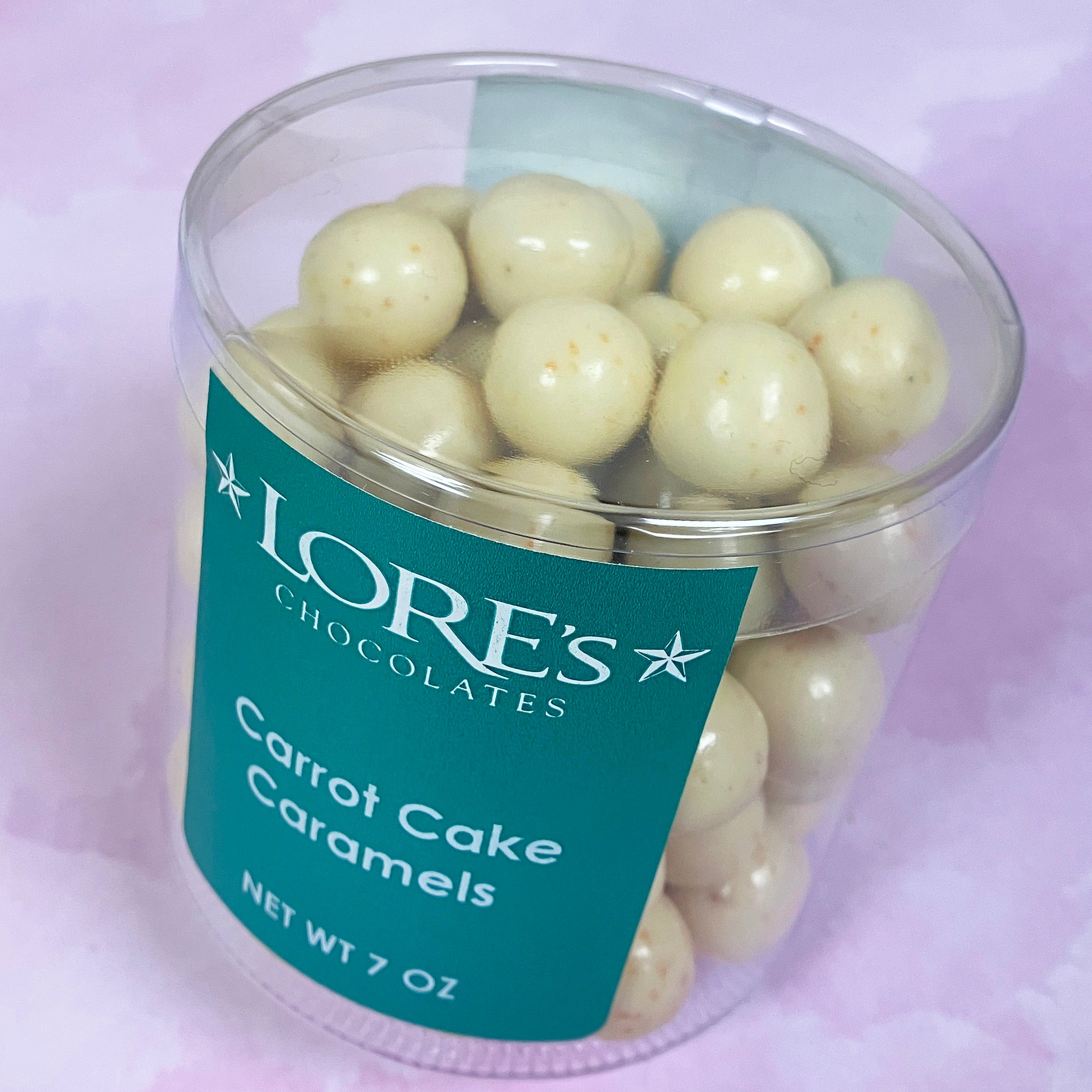 "Carrot Cake Caramels" packaged in a short cylinder container - sold by "Lore's Chocolates"
