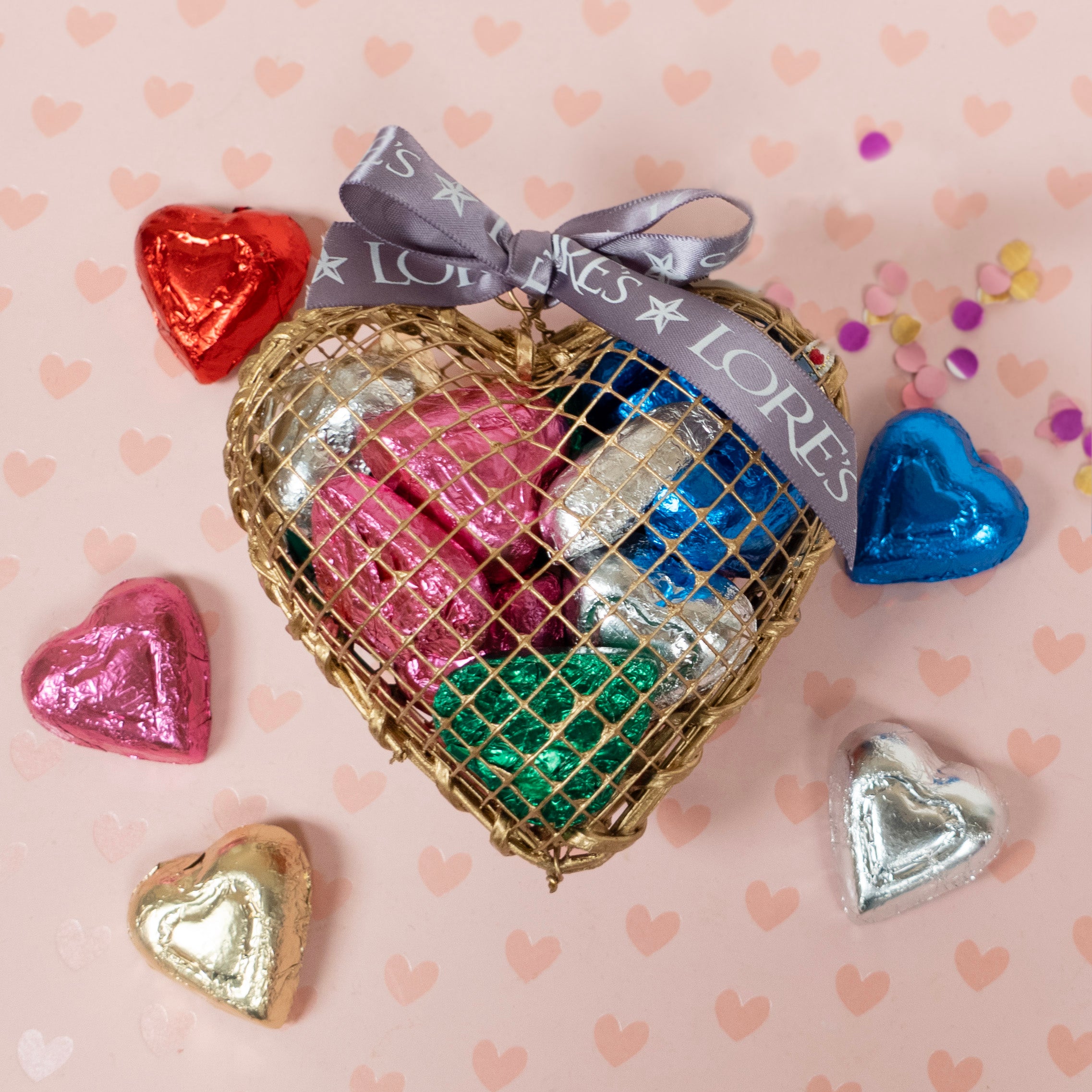gold wired cage full of foiled milk chocolate valentines day hearts