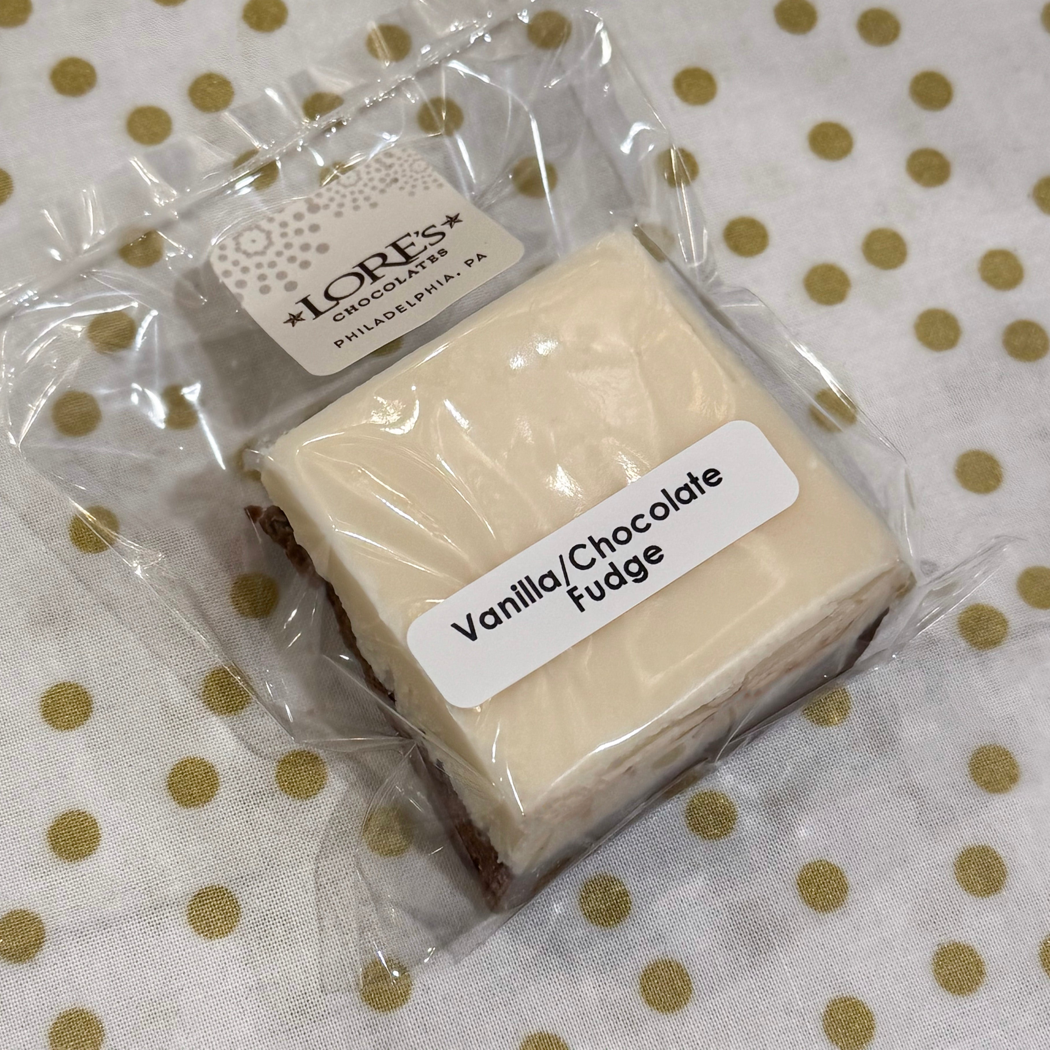 Packaged vanilla/chocolate fudge with a label on a polka dot background - handmade by Lore's Chocolates in Philadelphia