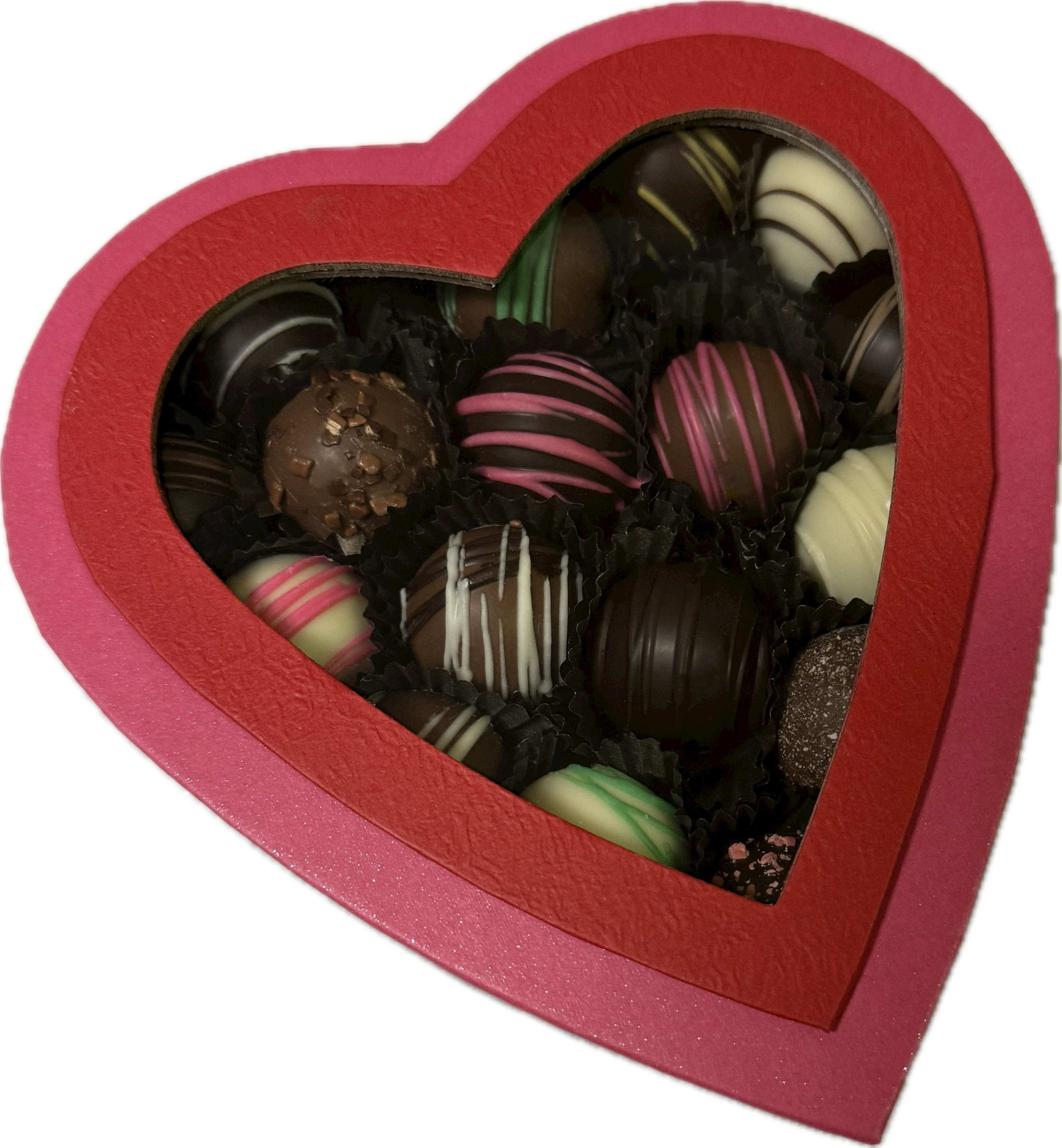 heart shaped valentines box full of assorted chocolate truffles