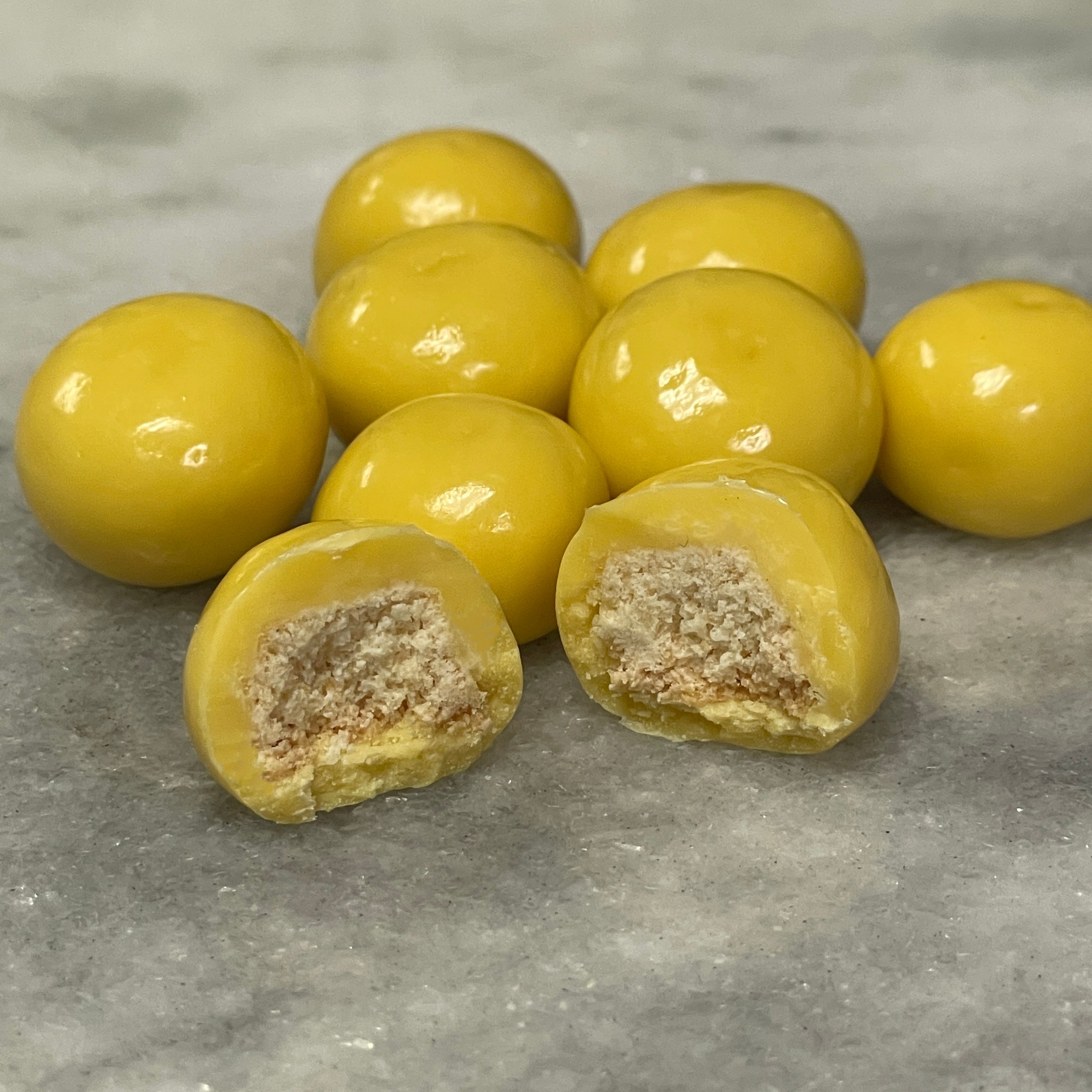 Bite sized Lemon shortbread cookie bites drenched in lemon white chocolate