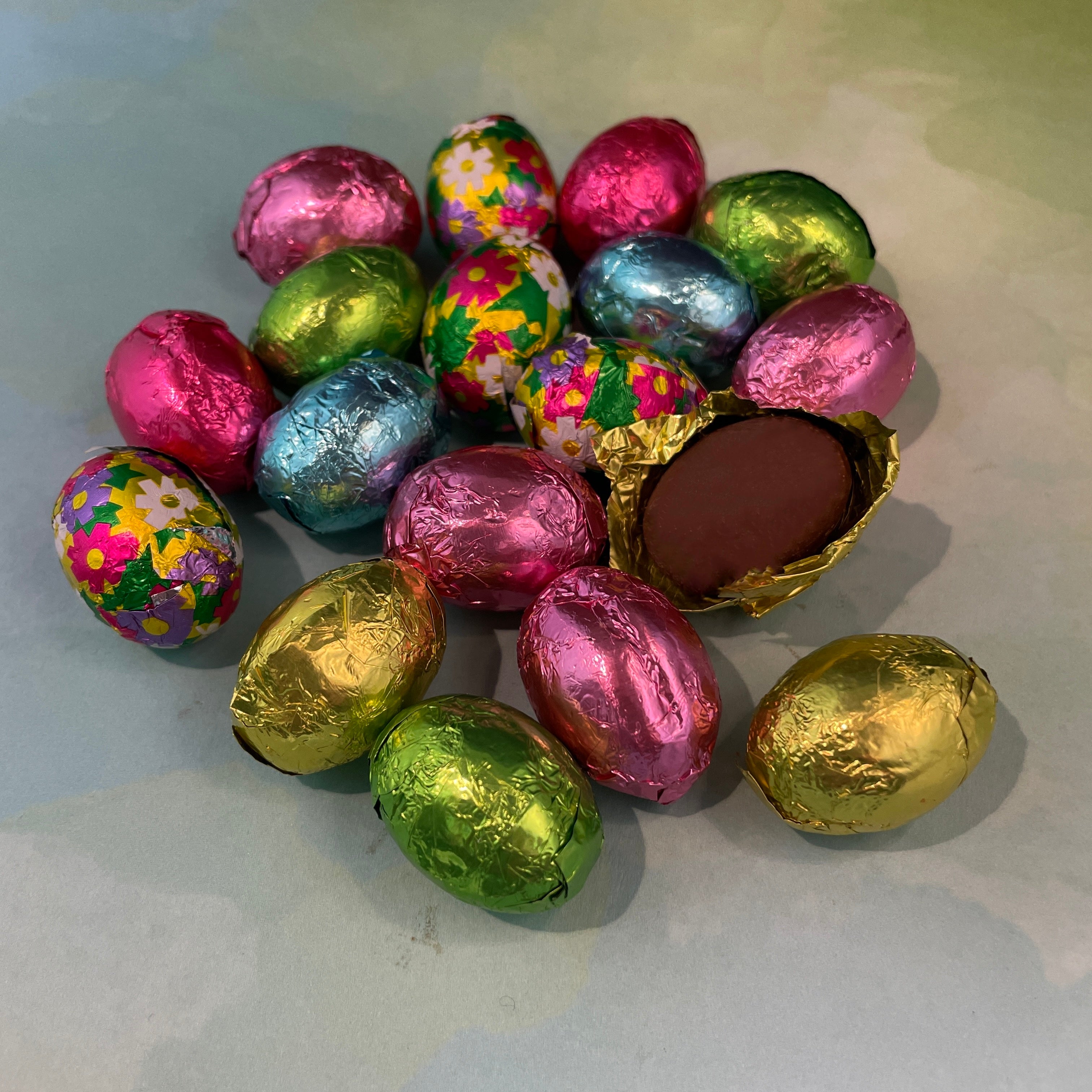 Foiled Bite Sized Eggs - Milk Chocolate - Spring wrapped: yellow, pink, magenta, blue, green, and flowers