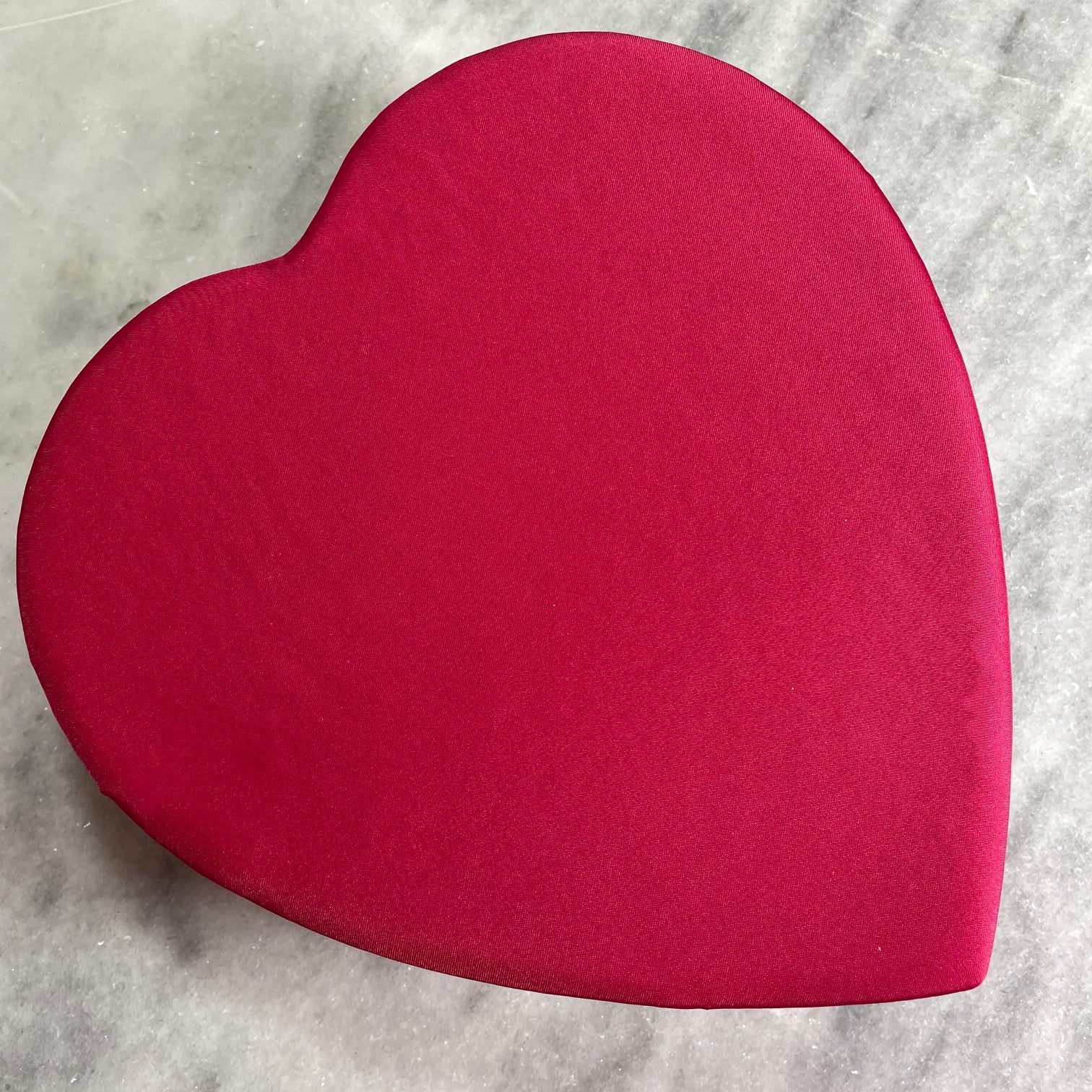 red satin heart shaped box -filled with our favorite selection-milk and dark chocolate