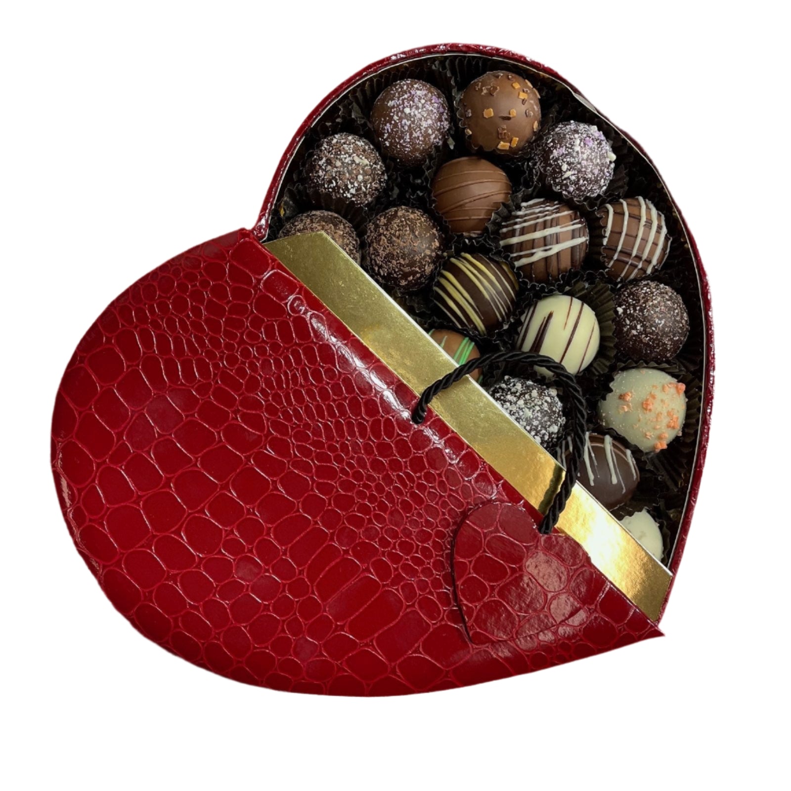 Heart shaped box with a crocodile/alligator leather pattern, opens in the middle with black cord with small alligator heart on door.  One side open to show the contents - Artisan Truffles from Lore's Chocolates