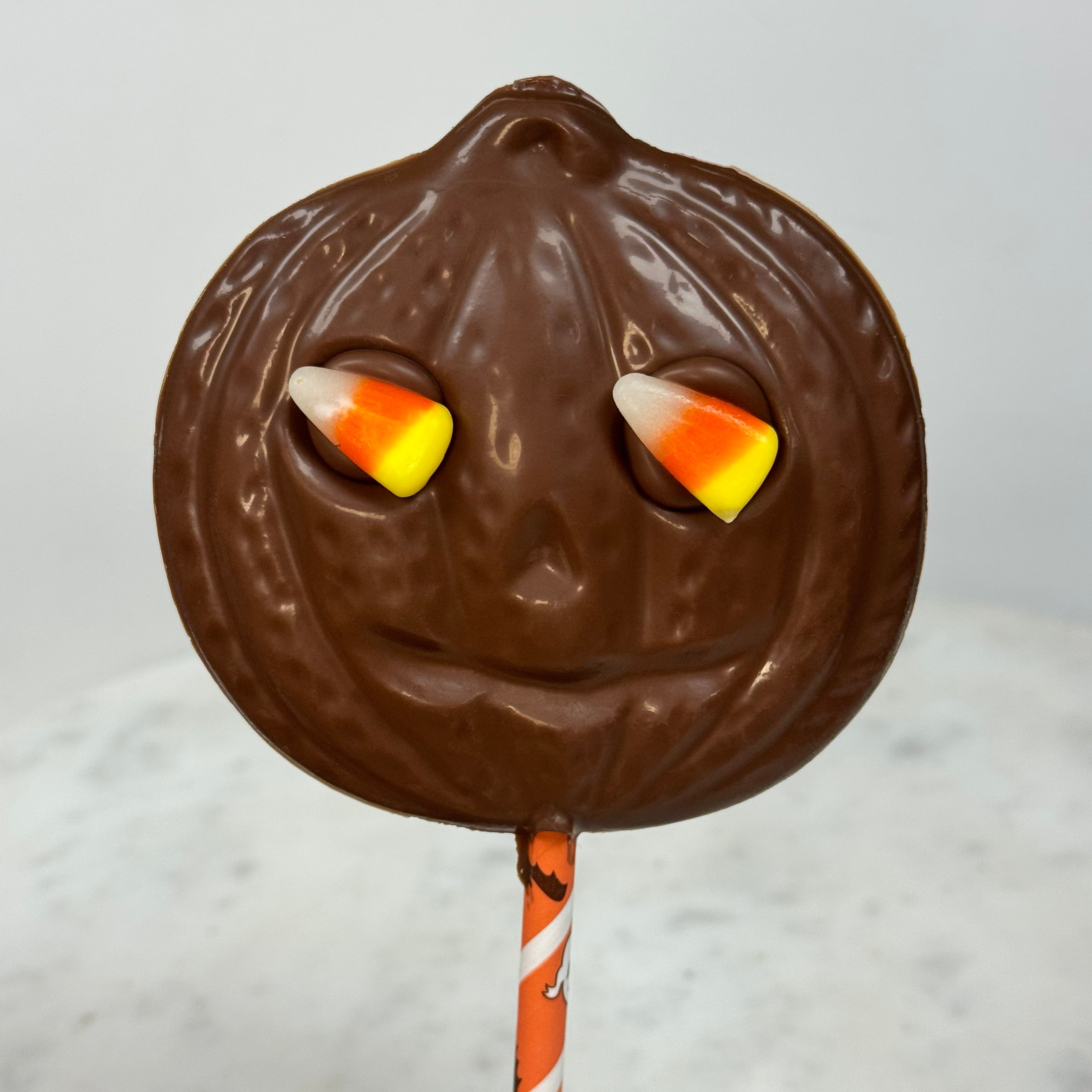 Pumpkin Face Lollipop with Candy Corn eyes