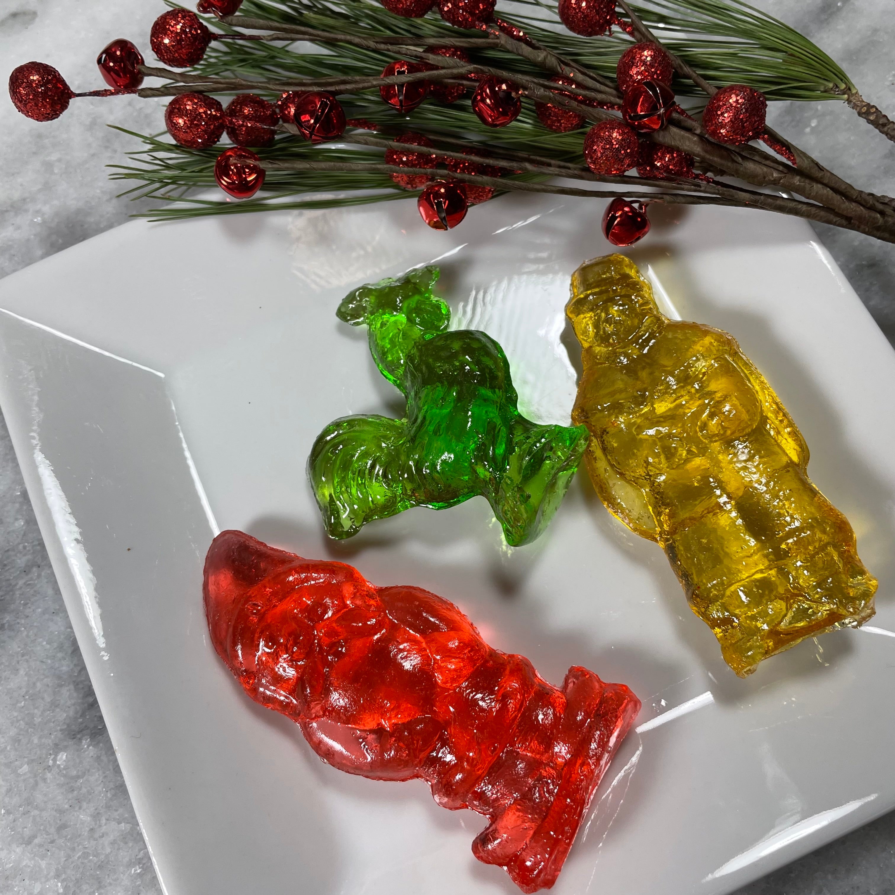 nostalgic clear toy hard candy-german christmas tradition - red santa, green hen, yellow winter man