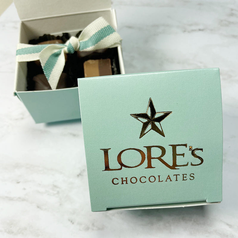 Lore's 4 piece sample box- Milk Caramel, Figaro (Hazelnut truffle),-Dark Sea Salt Caramel -Dark Vanilla Buttercream.