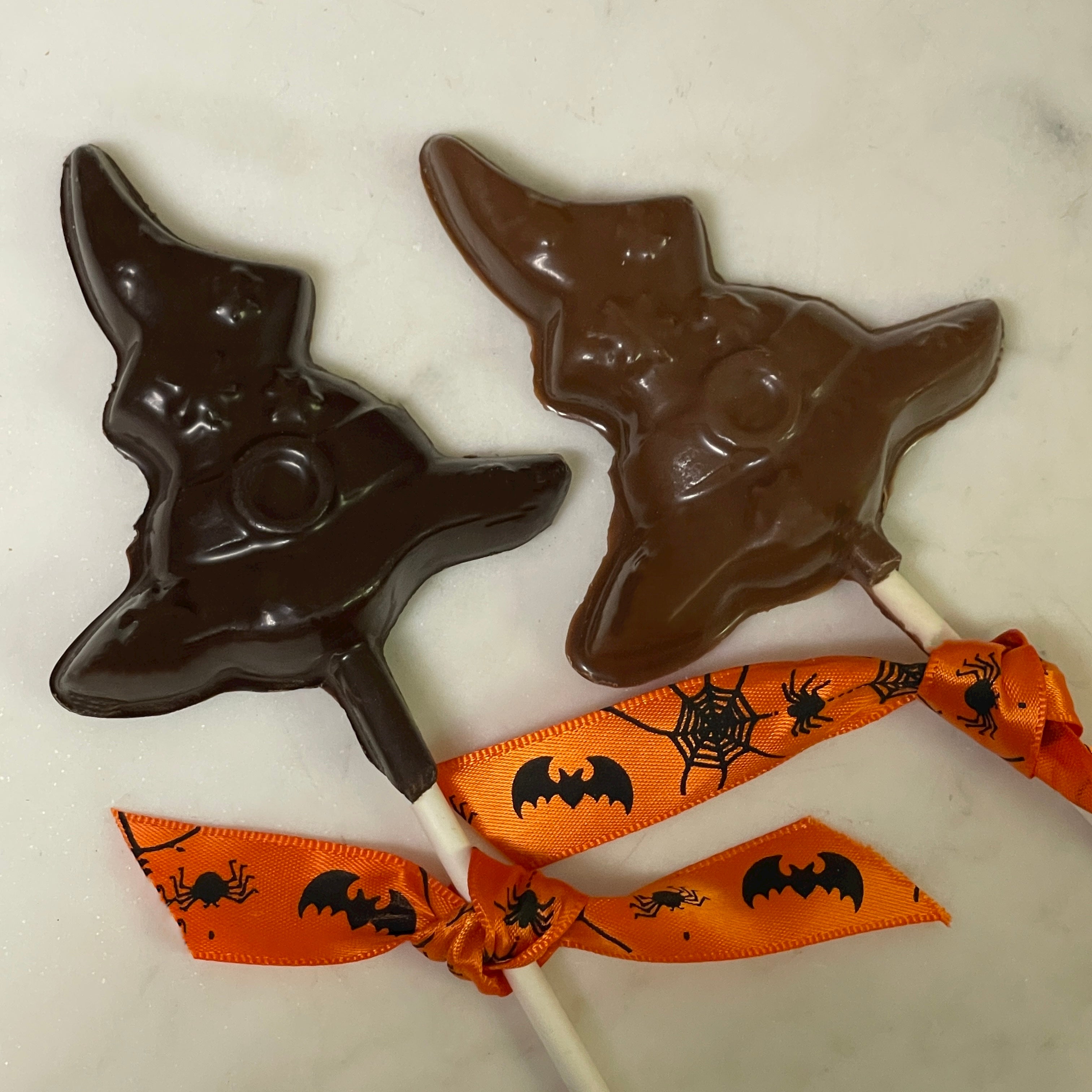 Wizard or witch hat lollipop made from solid dark chocolate or solid milk chocolate