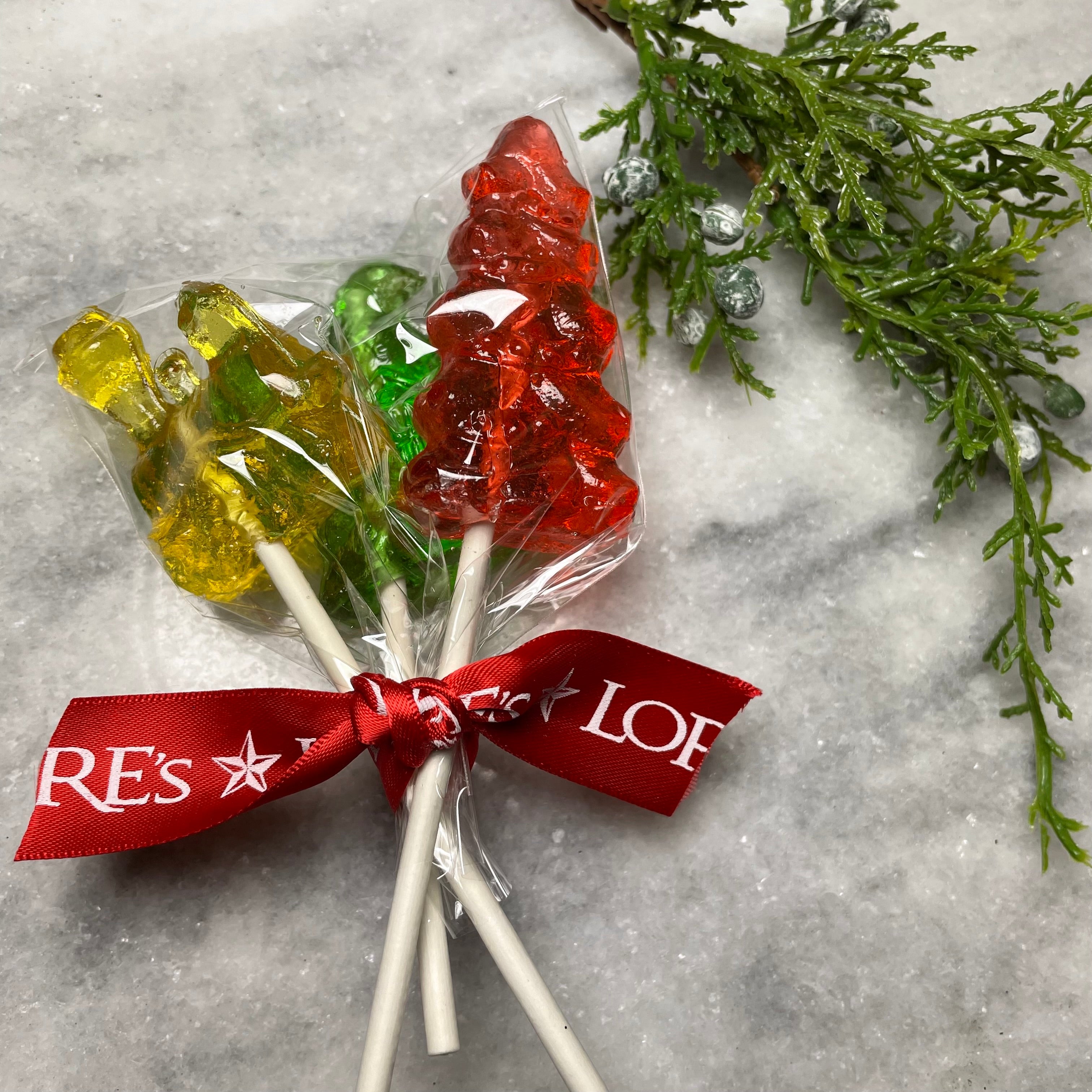 nostalgic clear toy hard candy-german christmas candy - yellow train, red christmas tree, green candy in back